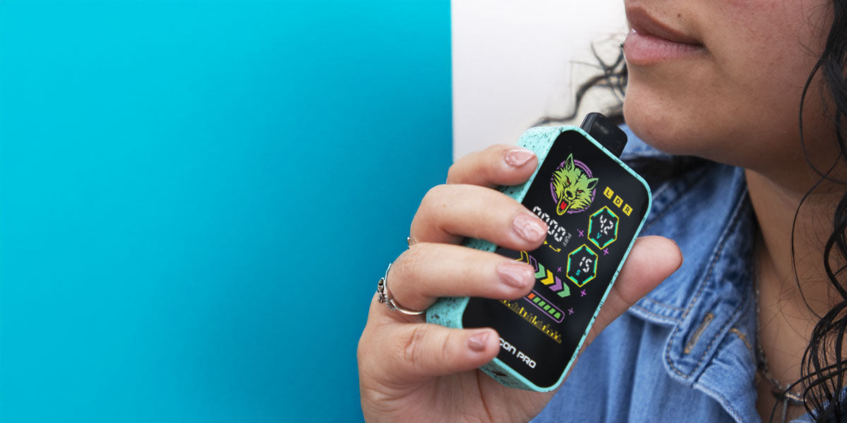 Woman holding Wulf Recon Pro in front of blue studio background